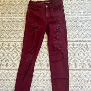 American Eagle size 2 maroon ripped skinny jeans
